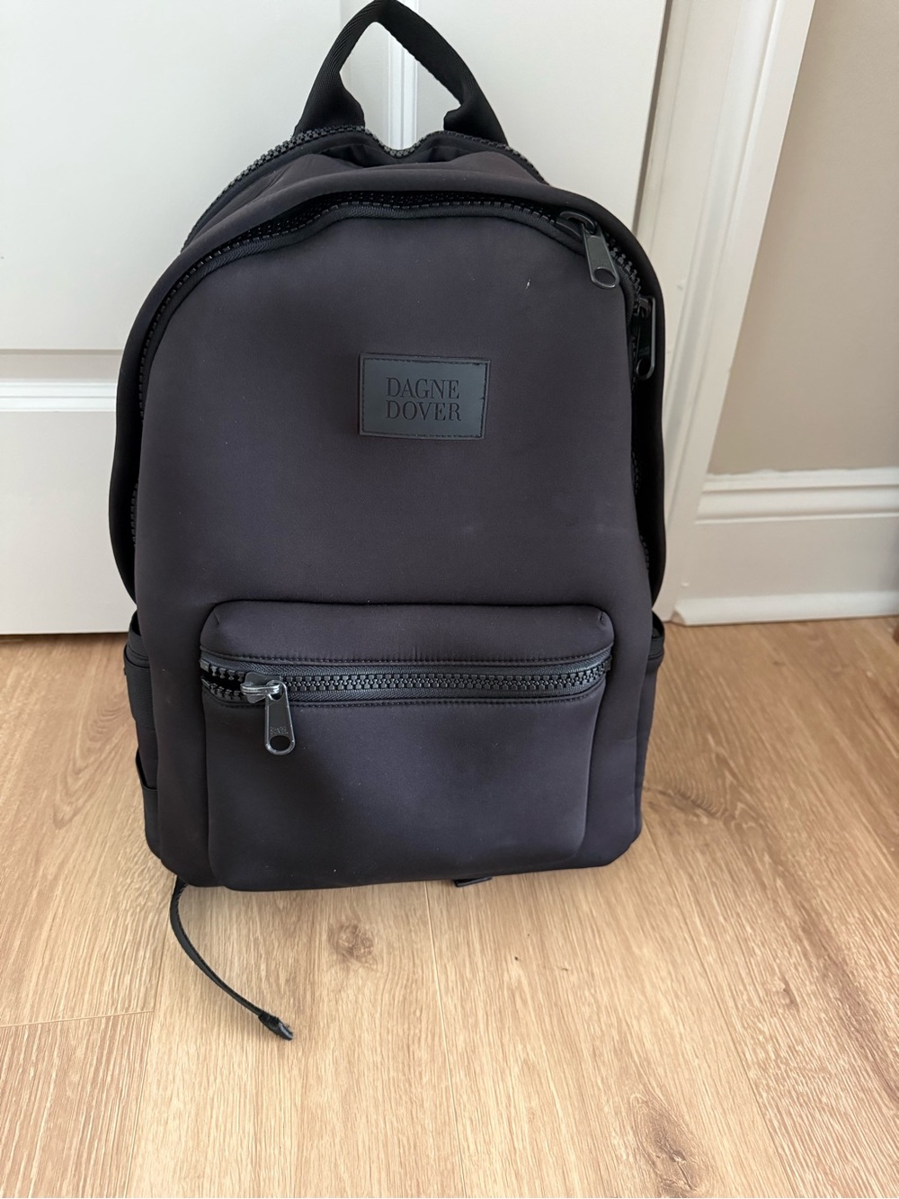 Dagne Dover Black Neoprene Backpack with Front Zip Pocket
